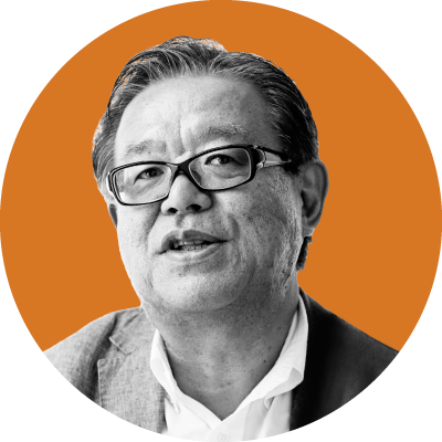An image of Foundation board member Dr Jun Murai. Image in black and white with an orange background.