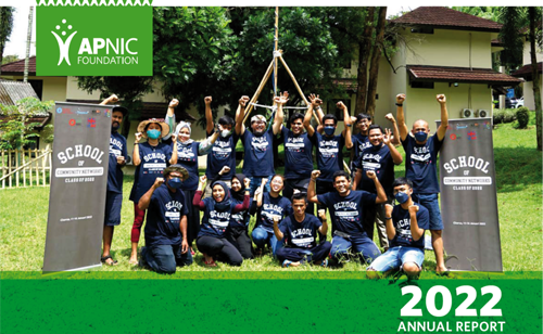 The cover of the 2022 Annual Report. It shows a group of people from the School of Community Networking in the Ciptagelar Kasepuhan region of Indonesia.