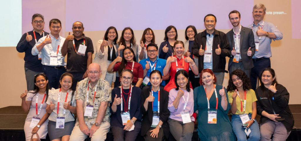 Foundation staff and project participants at the APNIC 54 conference in Singapore in 2022.