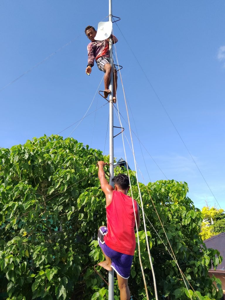 Maintenance of receiver equipment near Gilutongan school.