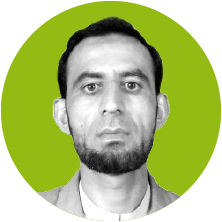 An image of Foundation Project Assistant Burhan Uddin, in black and white, on an olive green background.